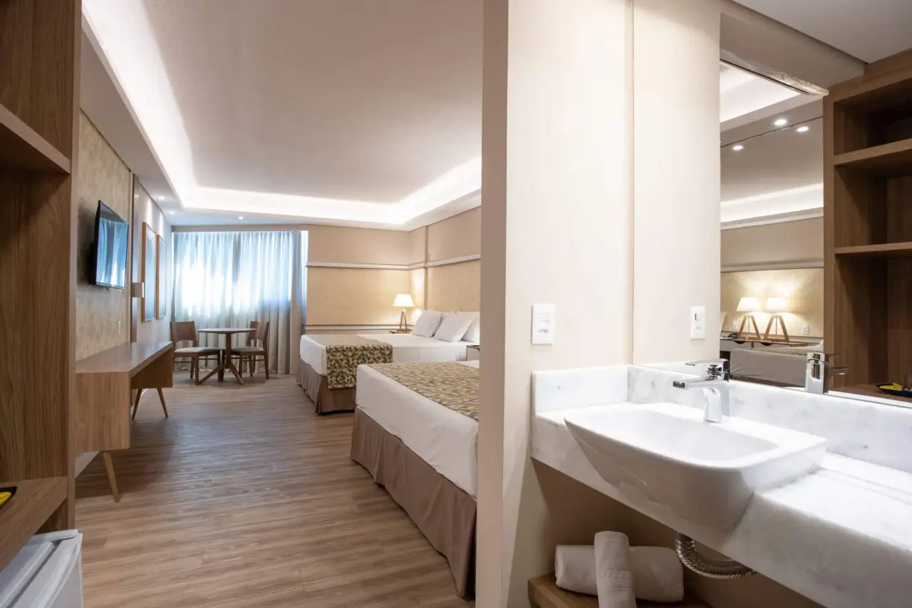 Deluxe Room with a double and a single bed