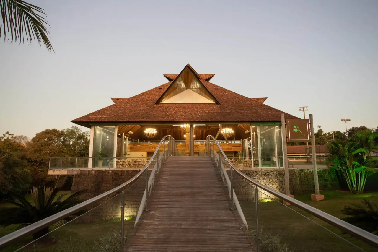 Wooden walkway to the gazebo at sunset