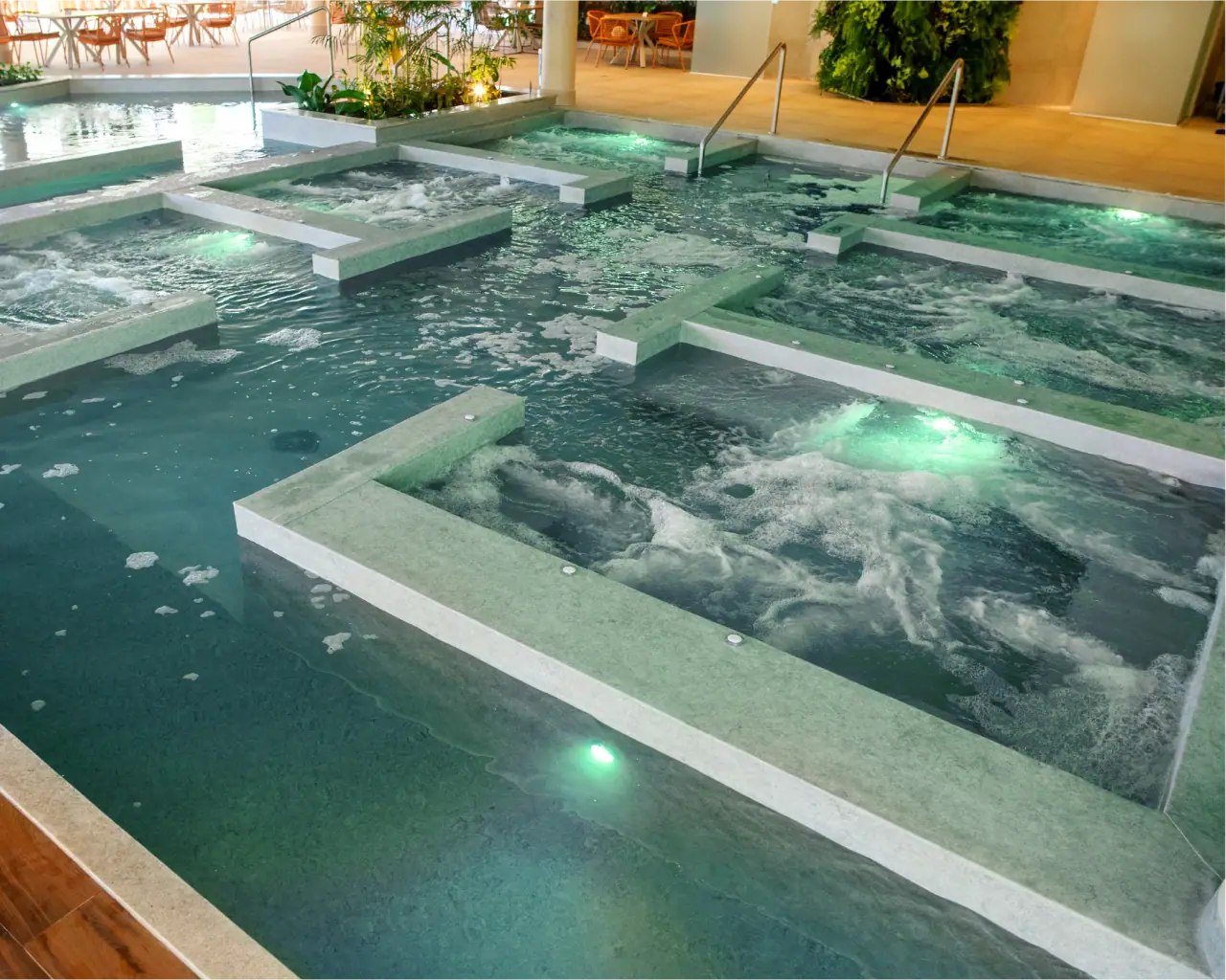 Indoor pool area with whirlpool