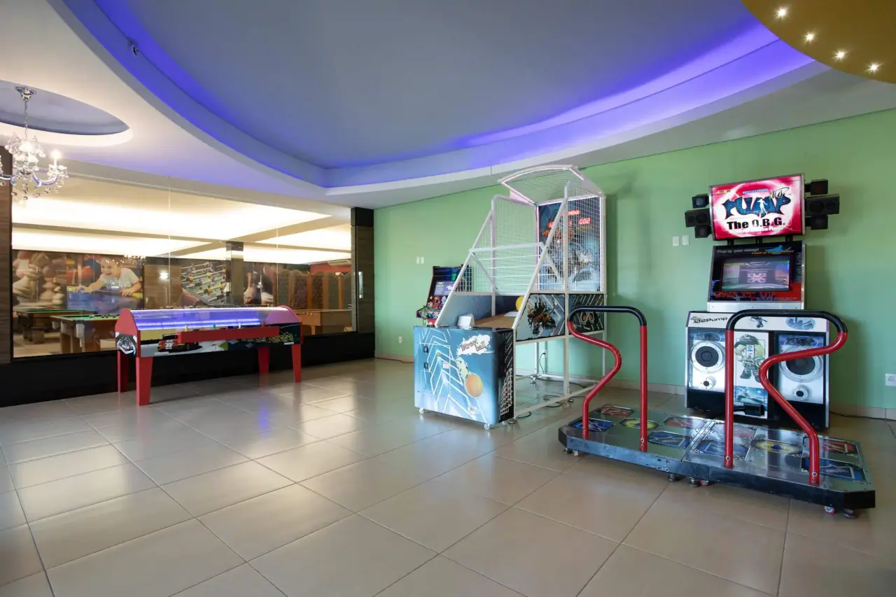 Arcade room with dance machine and colored lights